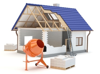 Hus med blandemaskine foran