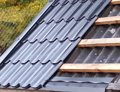 Ståltag lagt oven på eternit