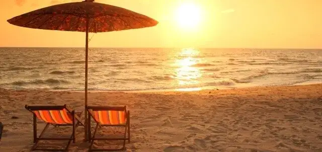 Parasol på stranden